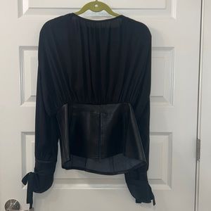 Black peplum blouse with pleather accents